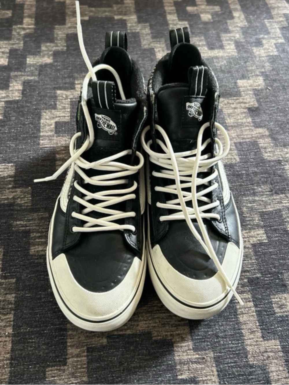 Vans Black and White High-Top Skate Sneakers
